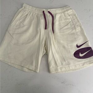 Nike Athletic Cream Shorts with Purple Details